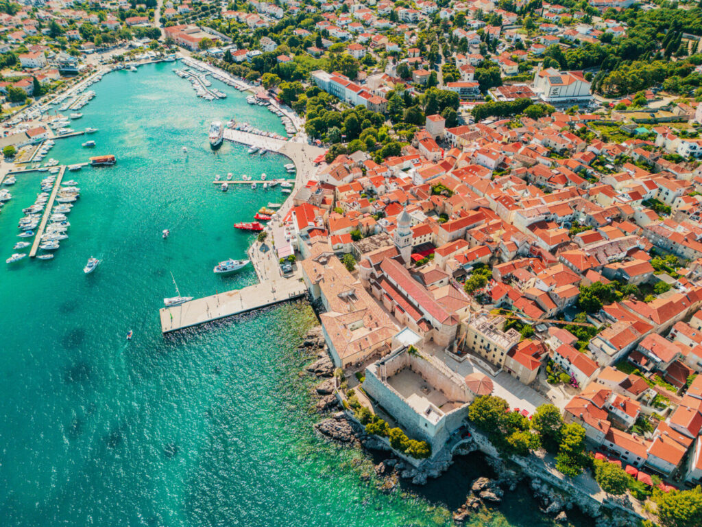 Aerial view of Krk town with its fortress, cathedral and waterfront, island of Krk, Croatia